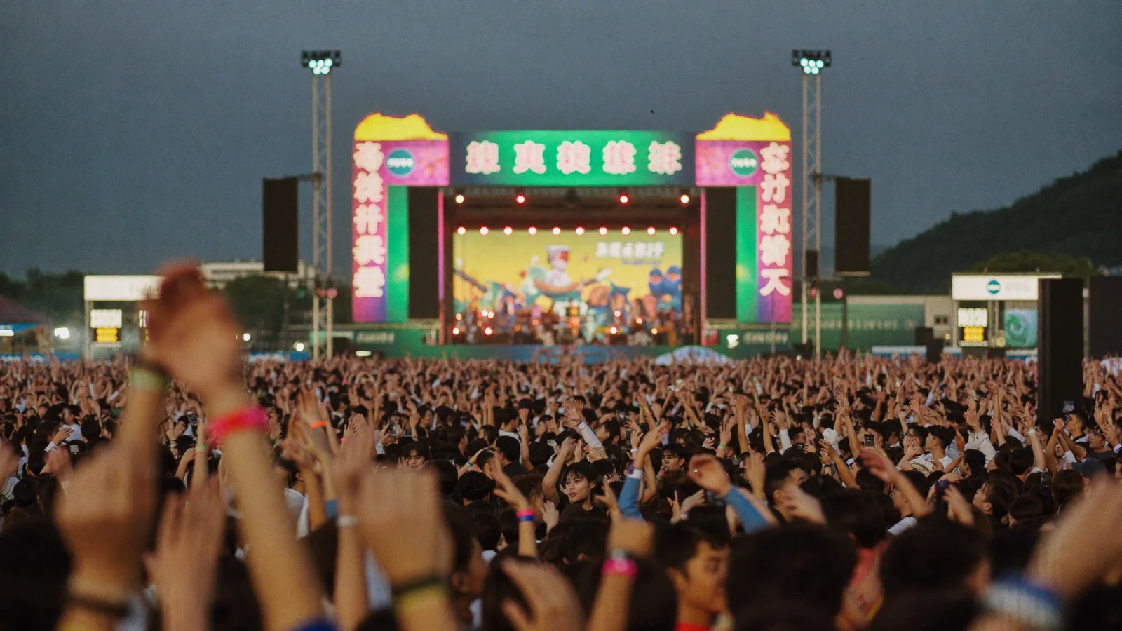 A crowd at an outdoor evening concert under stage lights — an illustrative image for the 903 Starry Breezy Live shows at Ngong Ping Village, not a photograph of the event