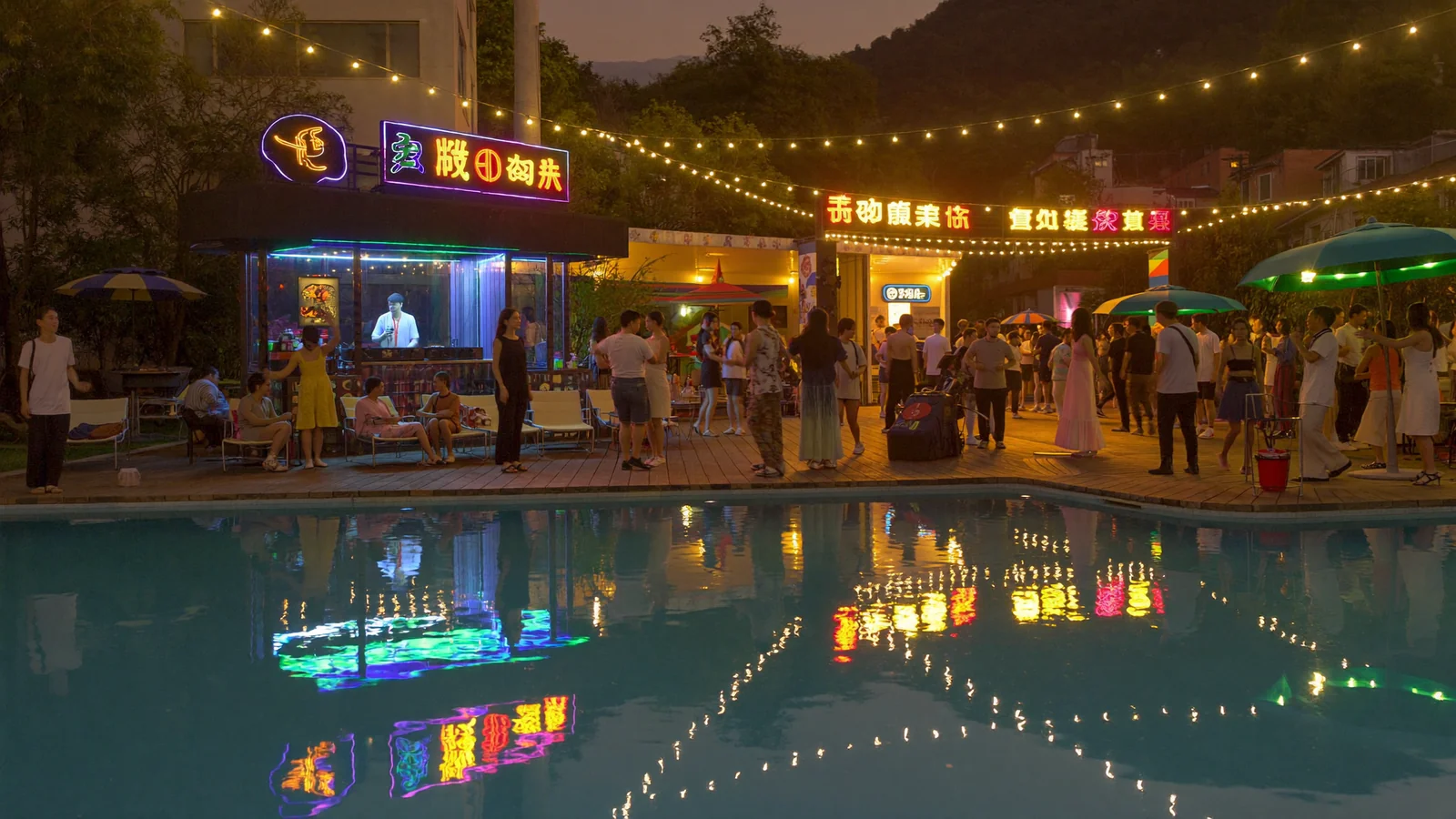 A retro 1980s-style poolside party at dusk with neon lights on the water and a DJ silhouette - an illustrative hero image for this guide to Canton Beats at Water World Ocean Park, not a photo of the actual event