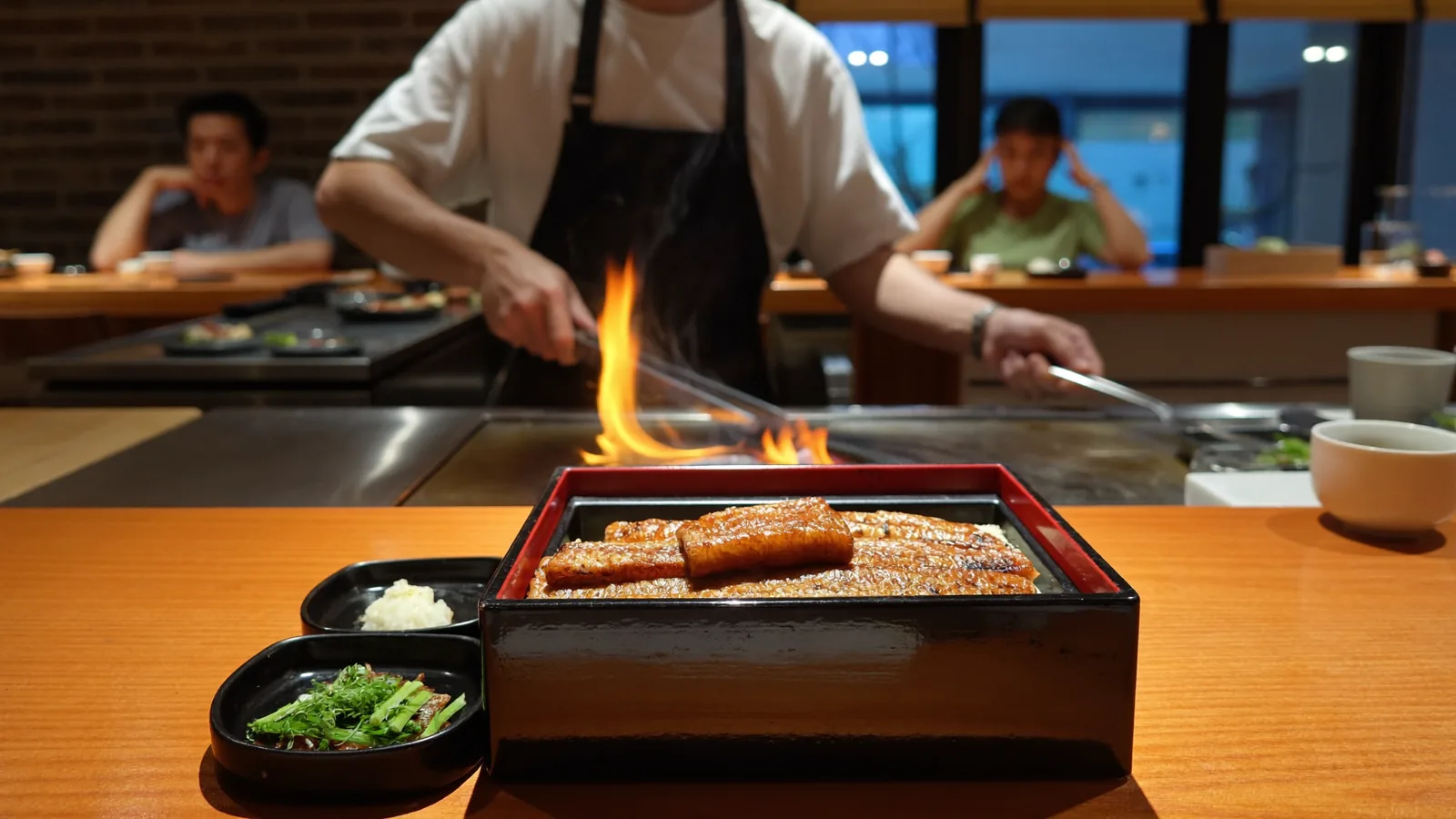 A Japanese charcoal-grill counter, illustrating Manmaru, the Shizuoka unagi specialist now open in Tuen Mun